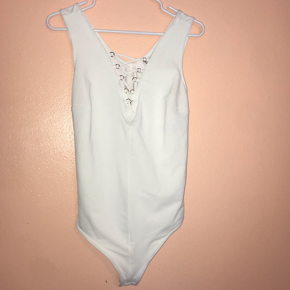 NWT WHITE BODY SUIT